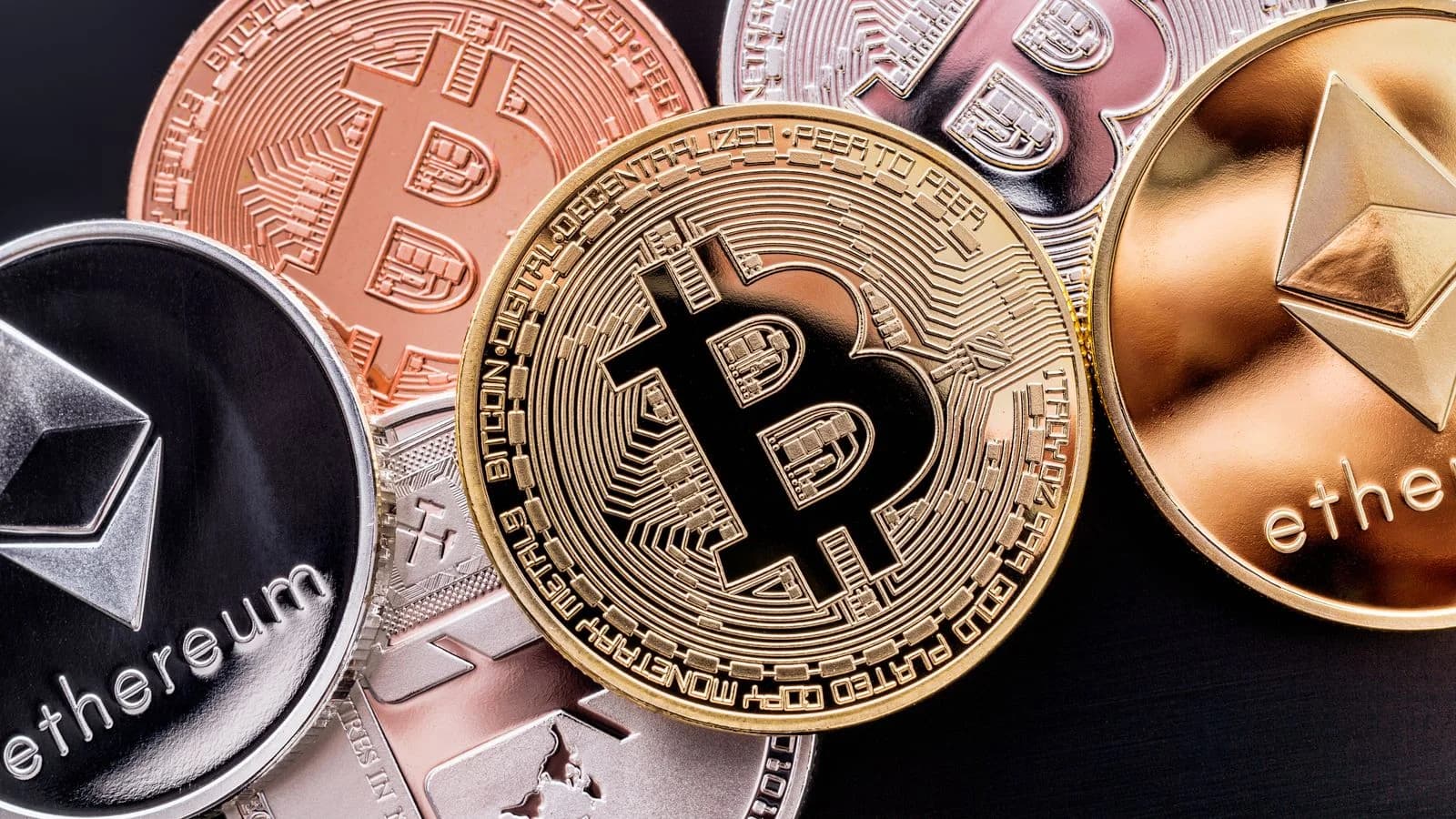 Four people charged with cryptocurrency investment scam