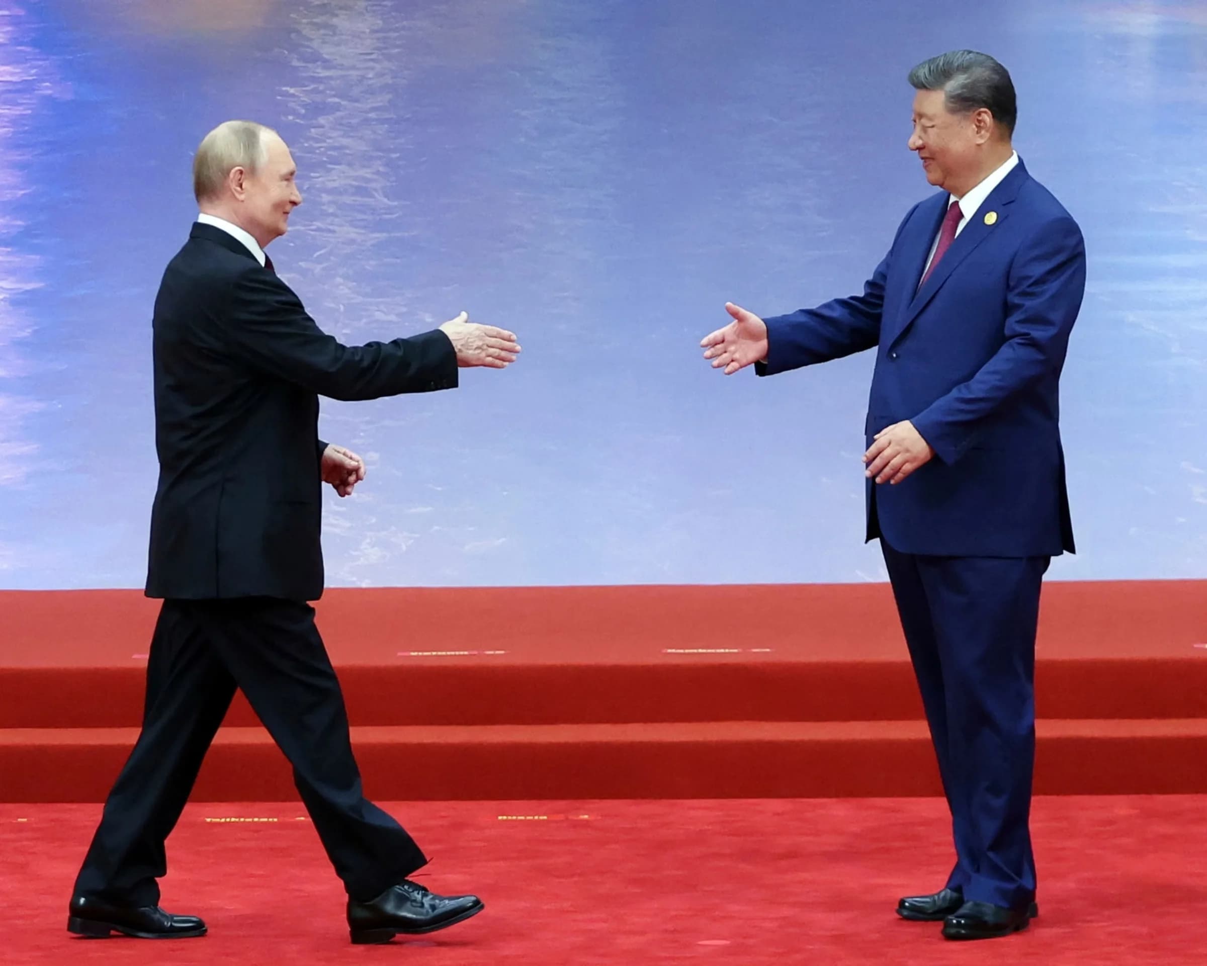 Xi and Putin reaffirm ties at China summit challenging US-led blocs